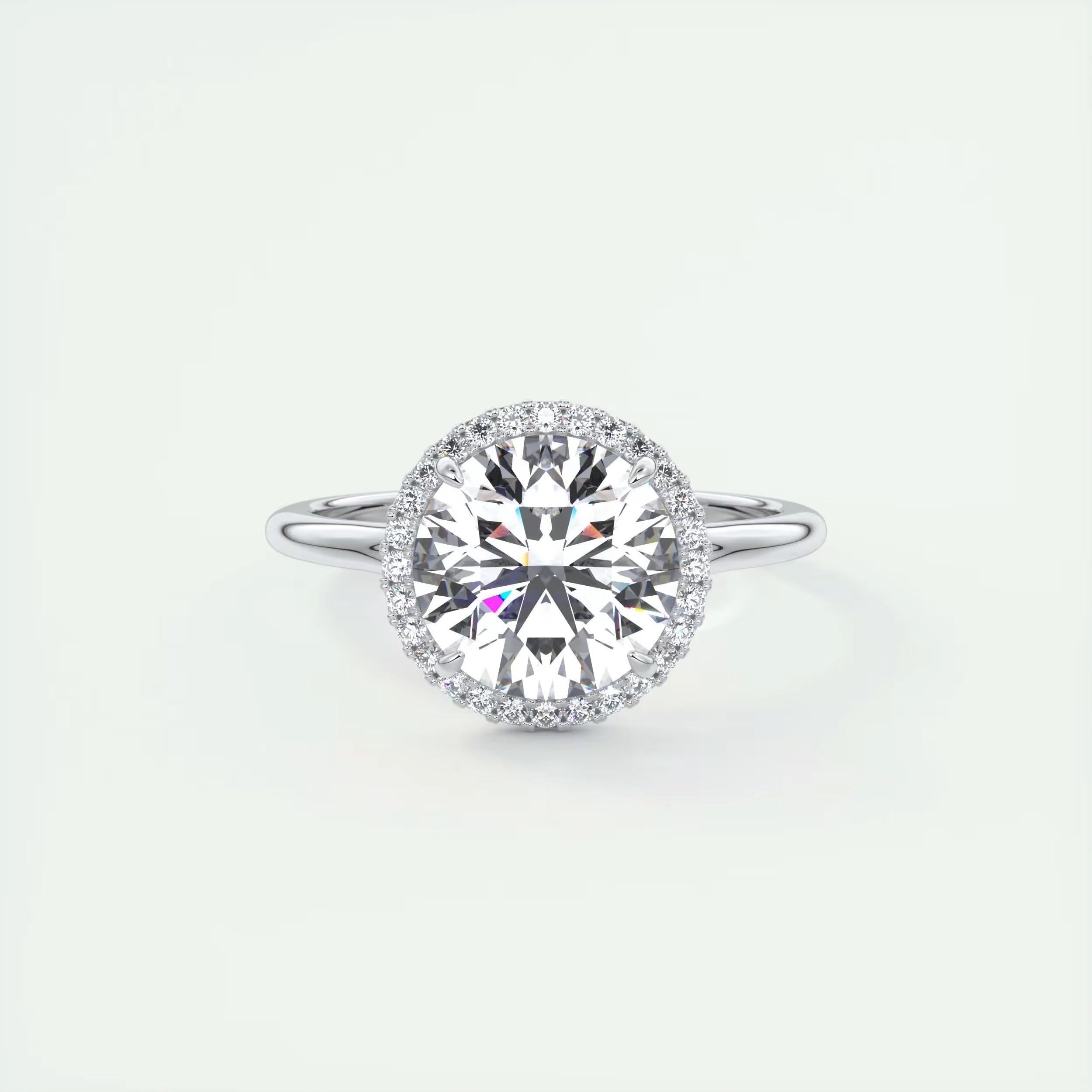2.15 Ct The Breezy Halo Round Center with French Set Halo Rings