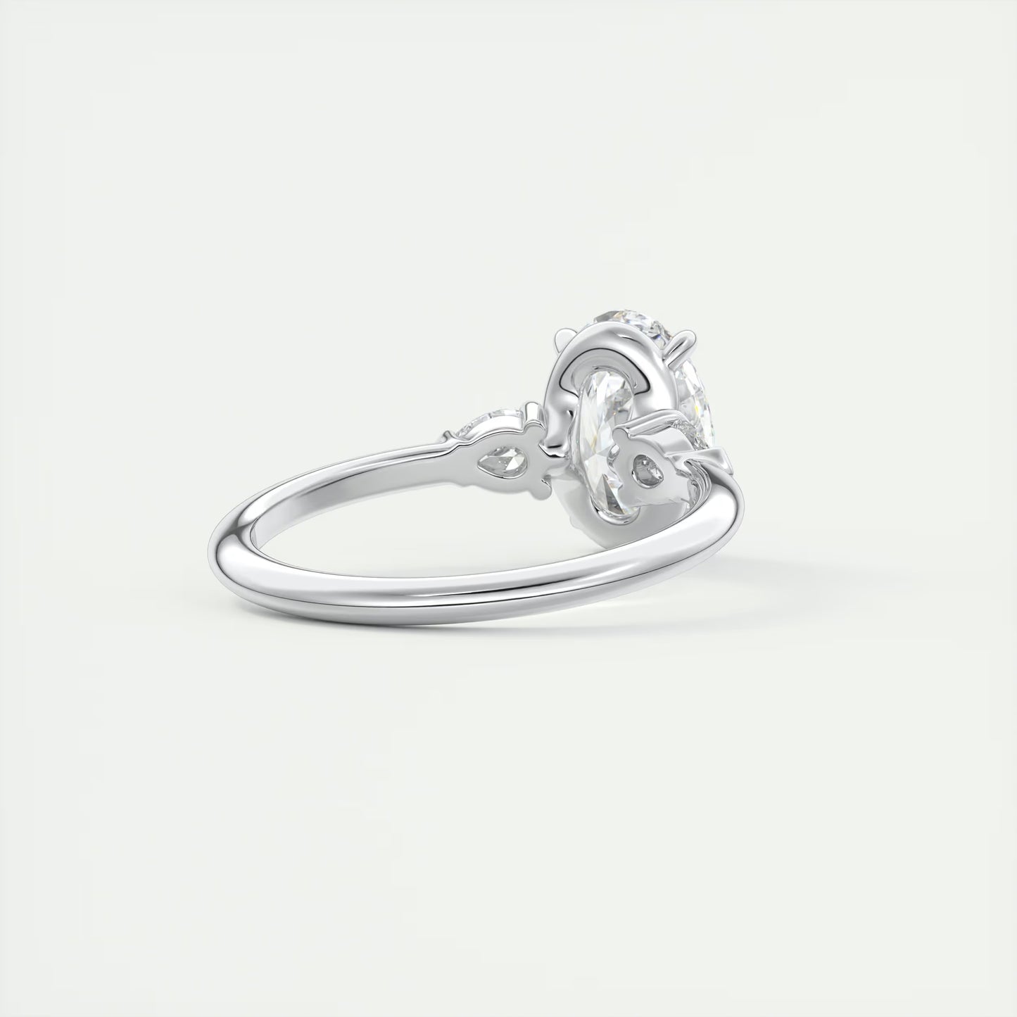 2.25 Ct Plunge Oval & Pears Three Stone Engagement Rings