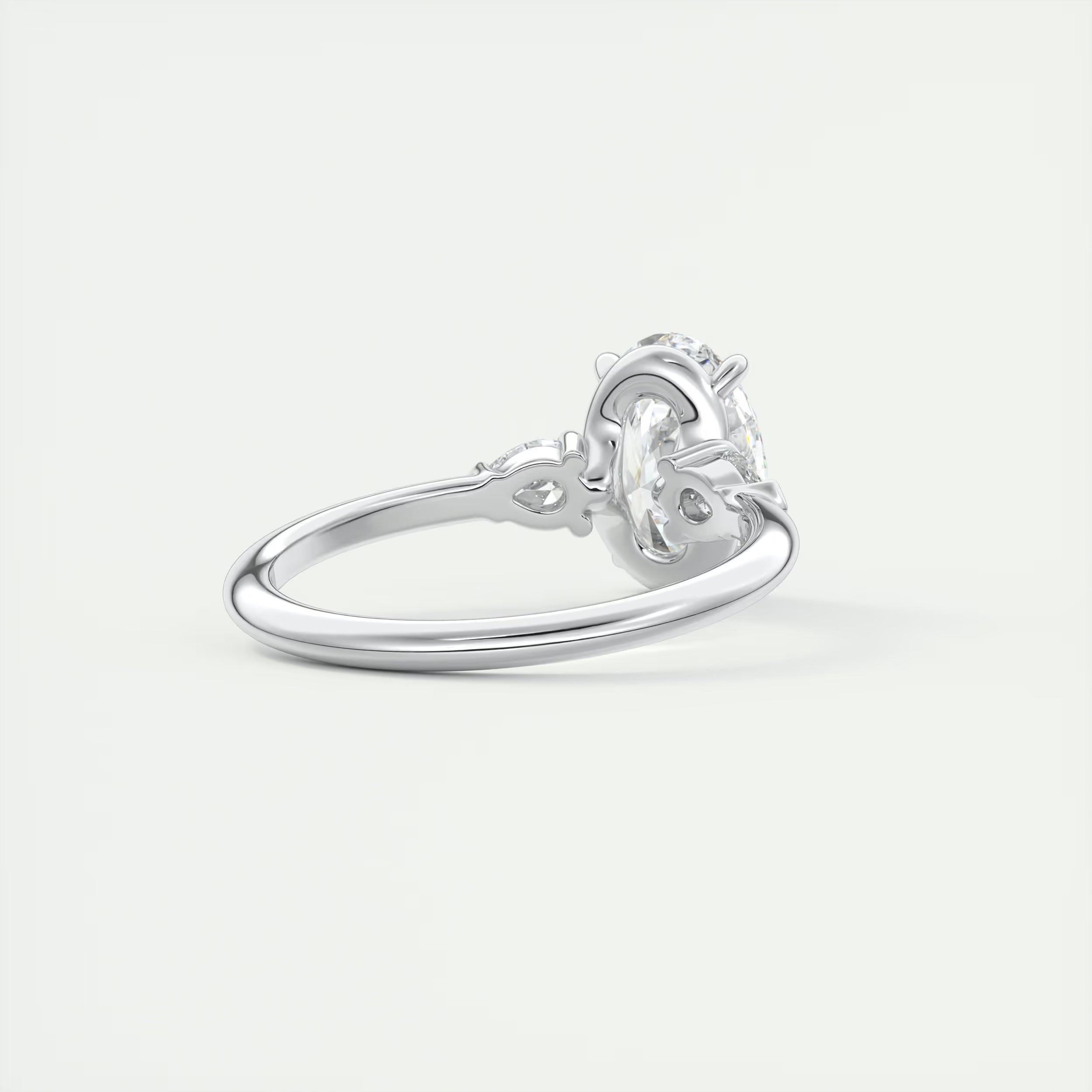 2.25 Ct Plunge Center Stone Oval & Side Stone Pear Engagement Rings