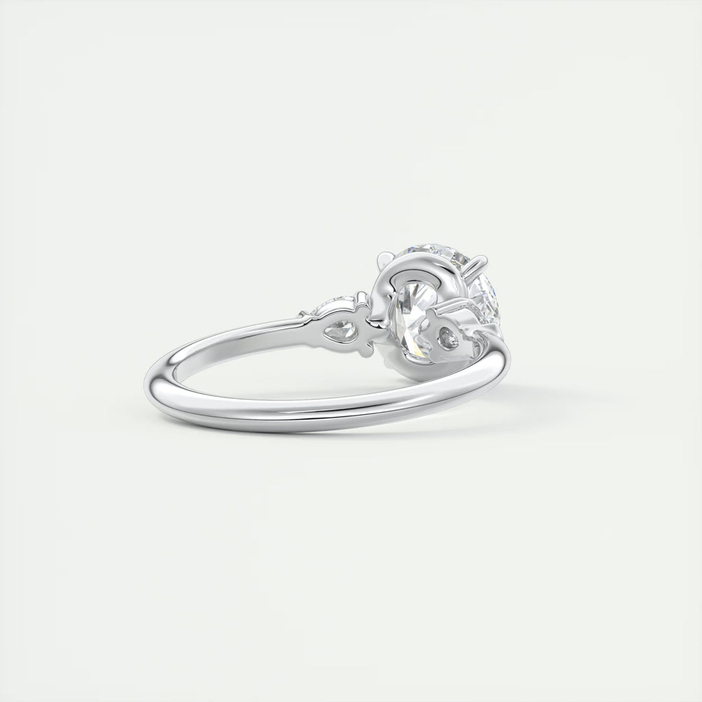 2.25 Ct Plunge Round & Pear Three Stone Engagement Rings