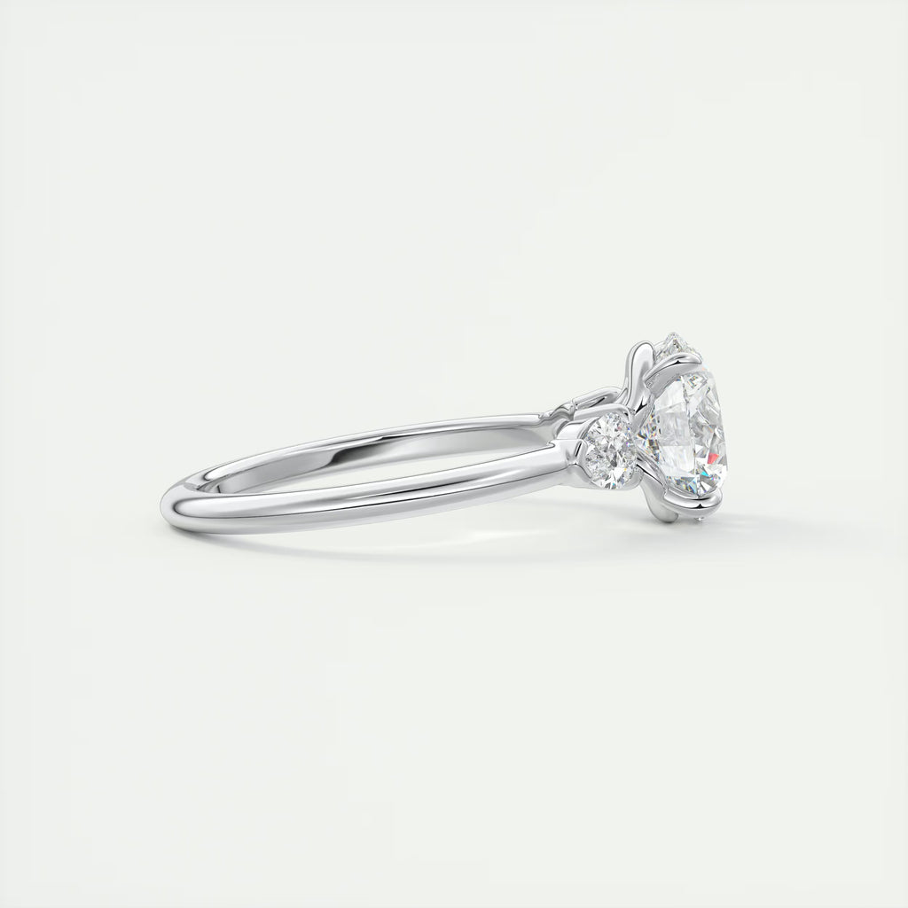2.25 Ct Plunge Round & Pear Three Stone Engagement Rings