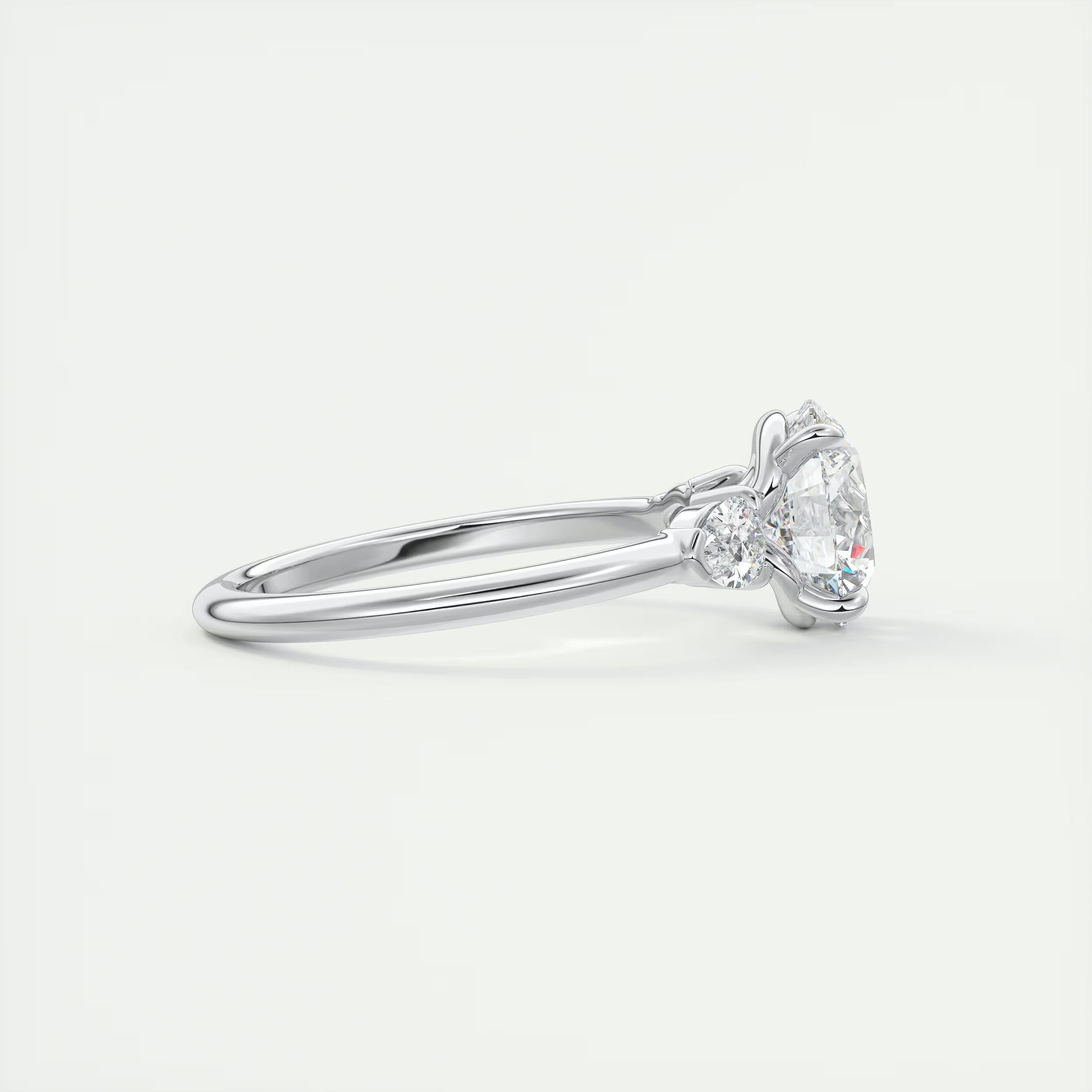 2.25 Ct Plunge Round & Pear Three Stone Engagement Rings