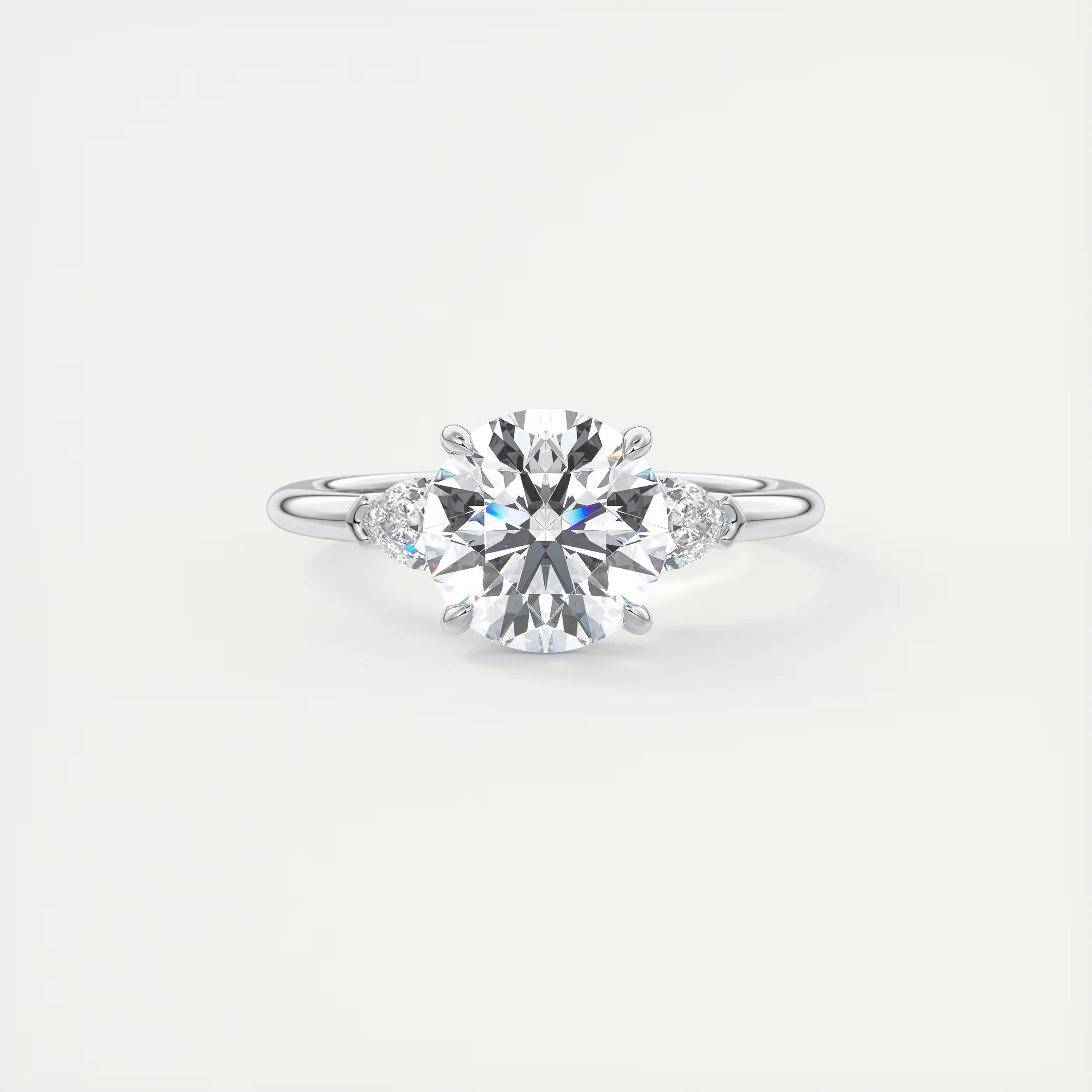 2.25 Ct Plunge Round & Pear Three Stone Engagement Rings