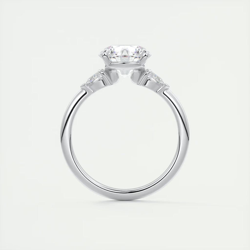 2.25 Ct Plunge Round & Pear Three Stone Engagement Rings