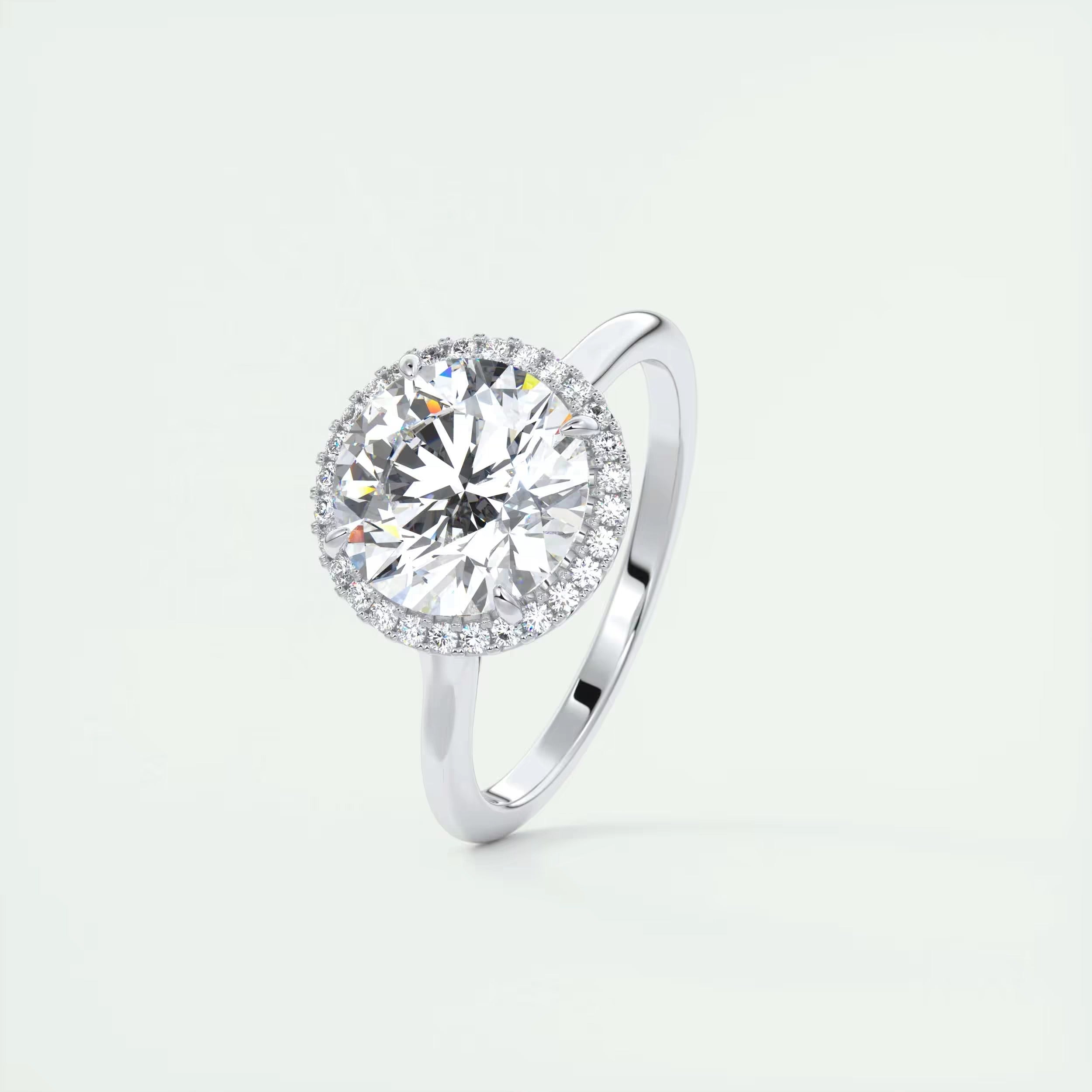 2.15 Ct The Breezy Halo Round Center with French Set Halo Rings