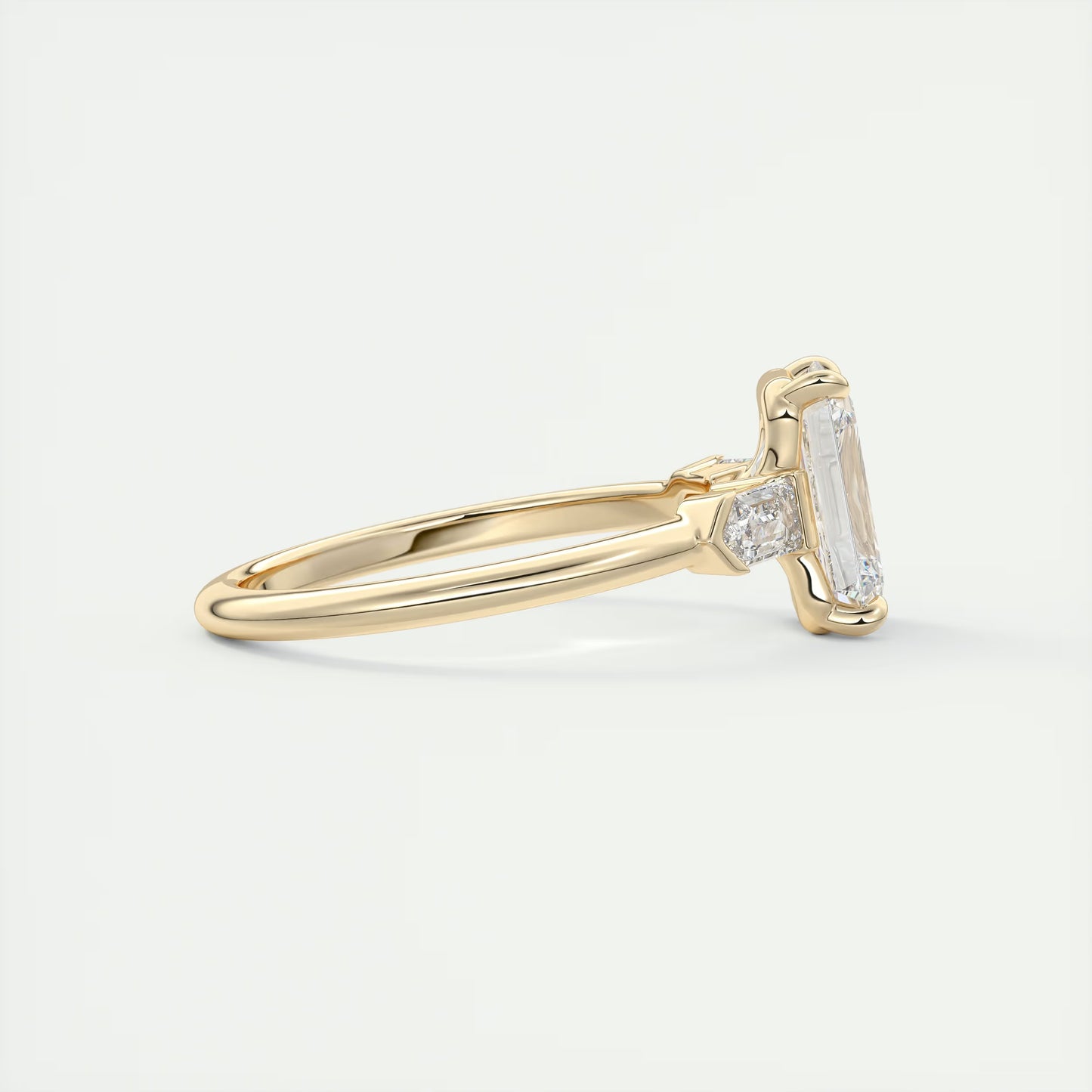 2.30 Ct Plunge Emerald & Bullets Three Stone Engagement Rings