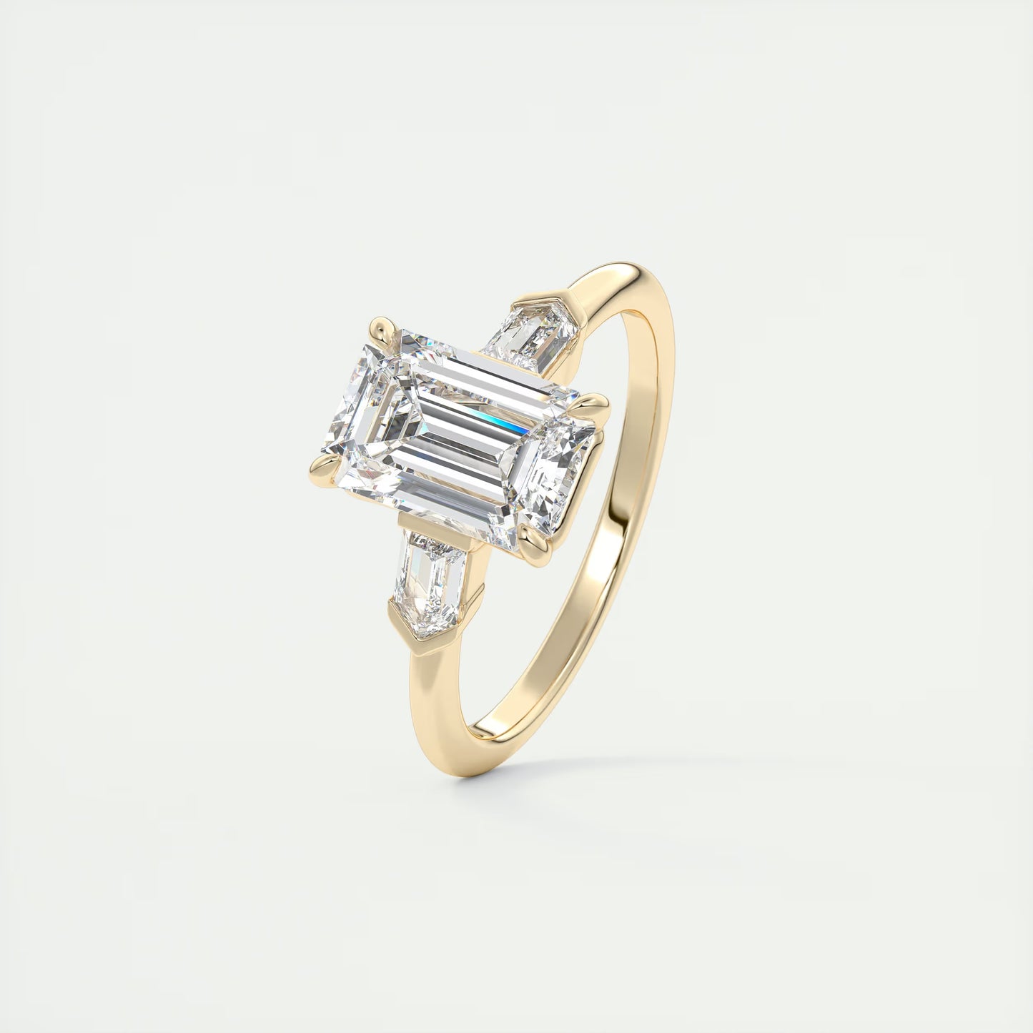 2.30 Ct Plunge Emerald & Bullets Three Stone Engagement Rings