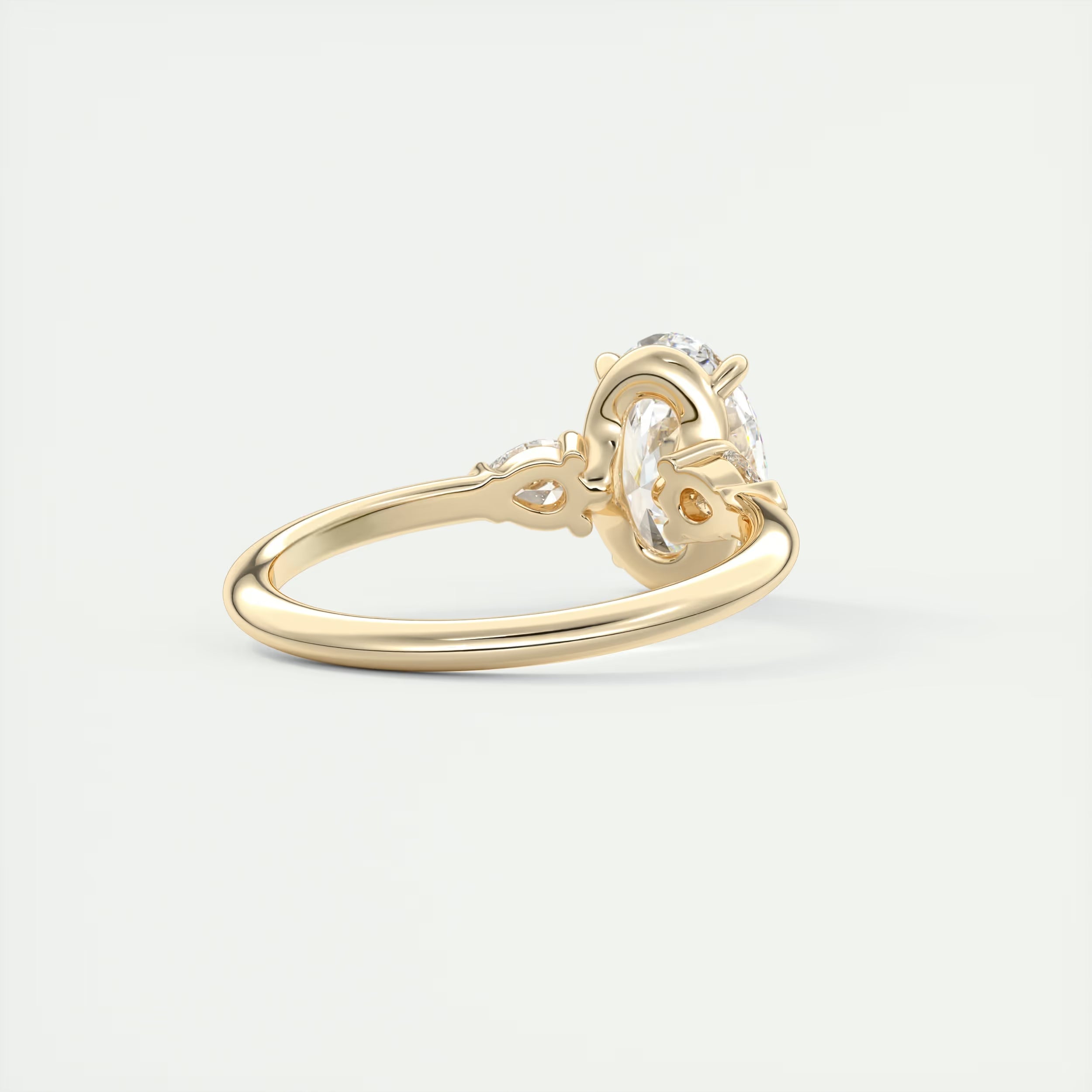 2.25 Ct Plunge Center Stone Oval & Side Stone Pear Engagement Rings