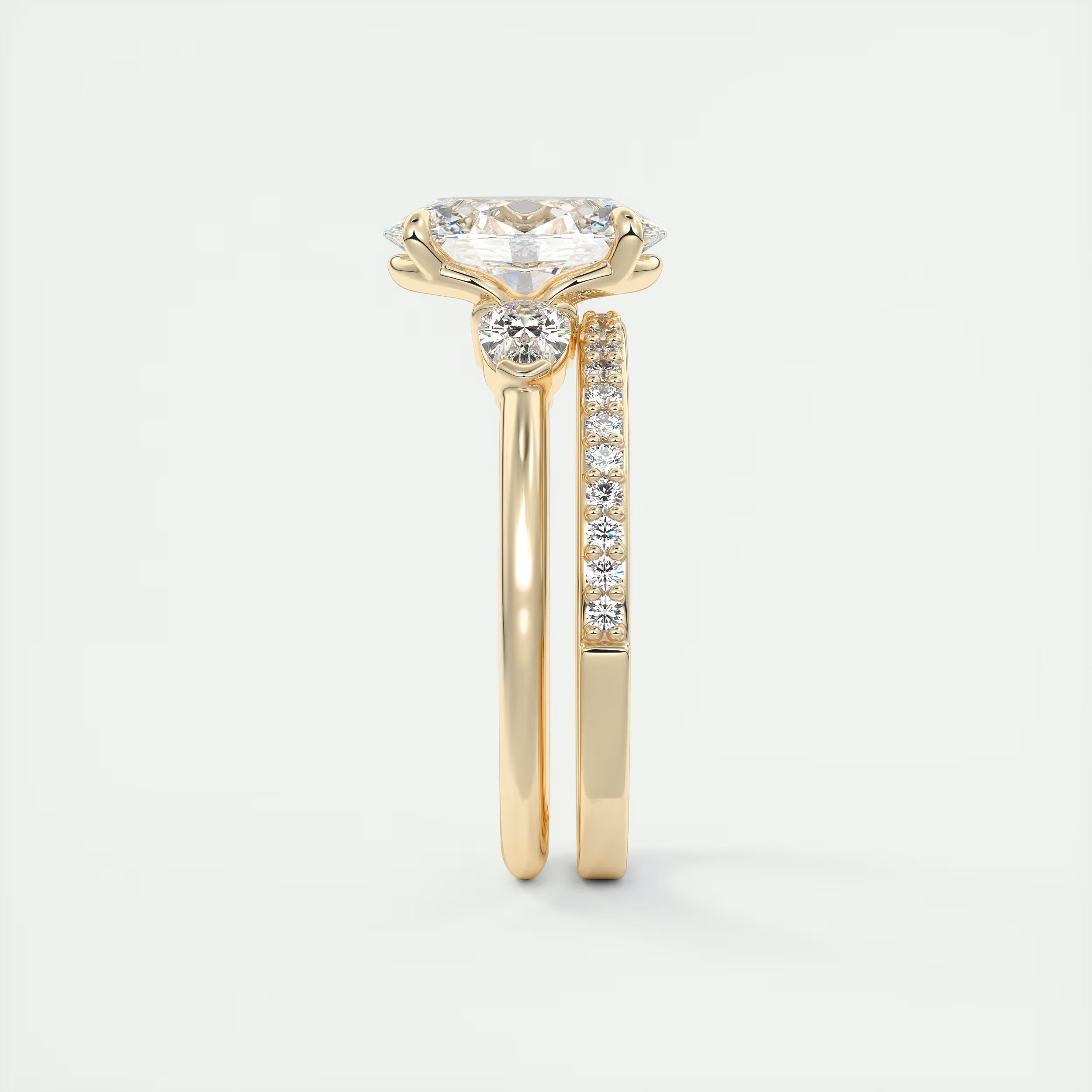 2.25 Ct Plunge Center Stone Oval & Side Stone Pear Engagement Rings