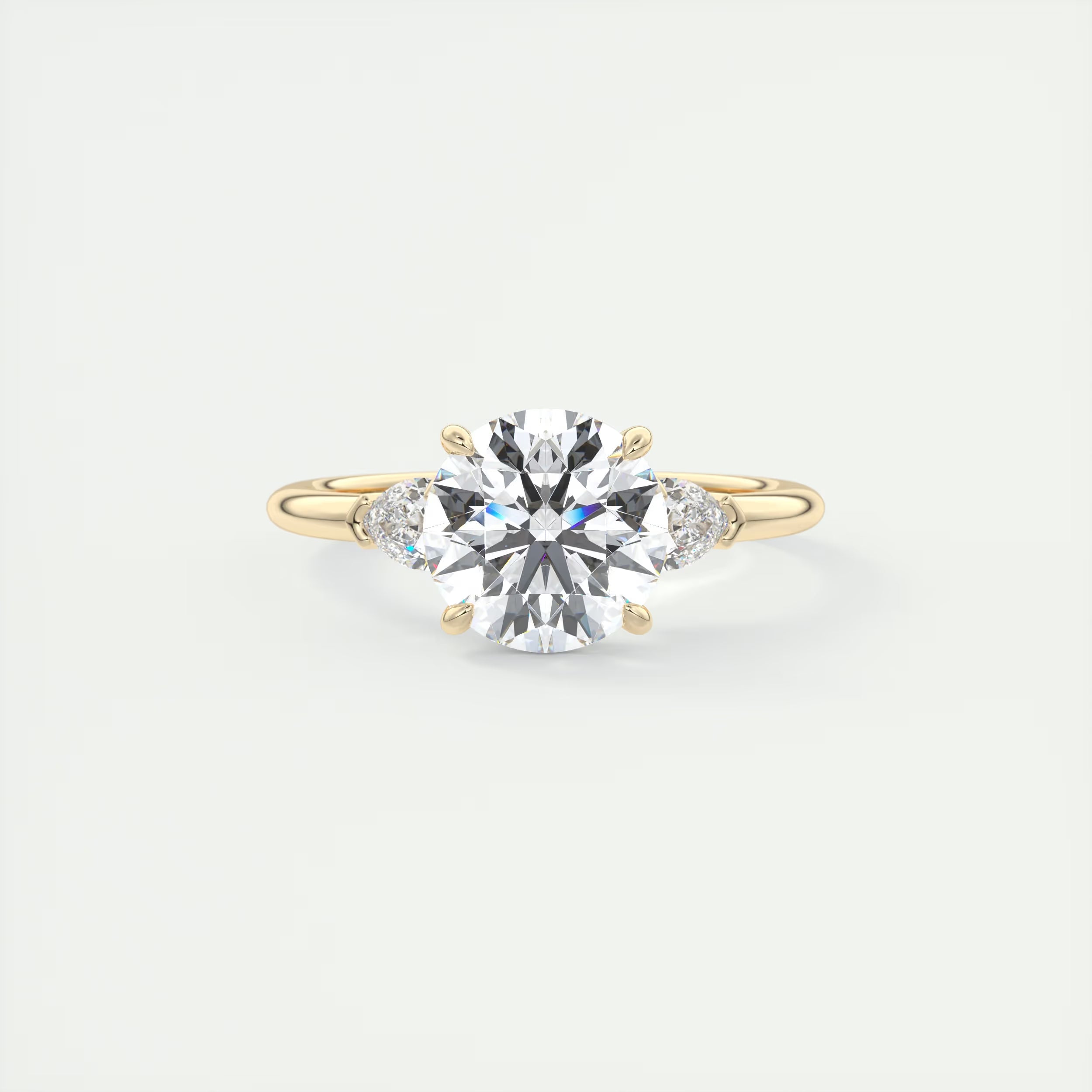 2.25 Ct Plunge Round & Pear Three Stone Engagement Rings