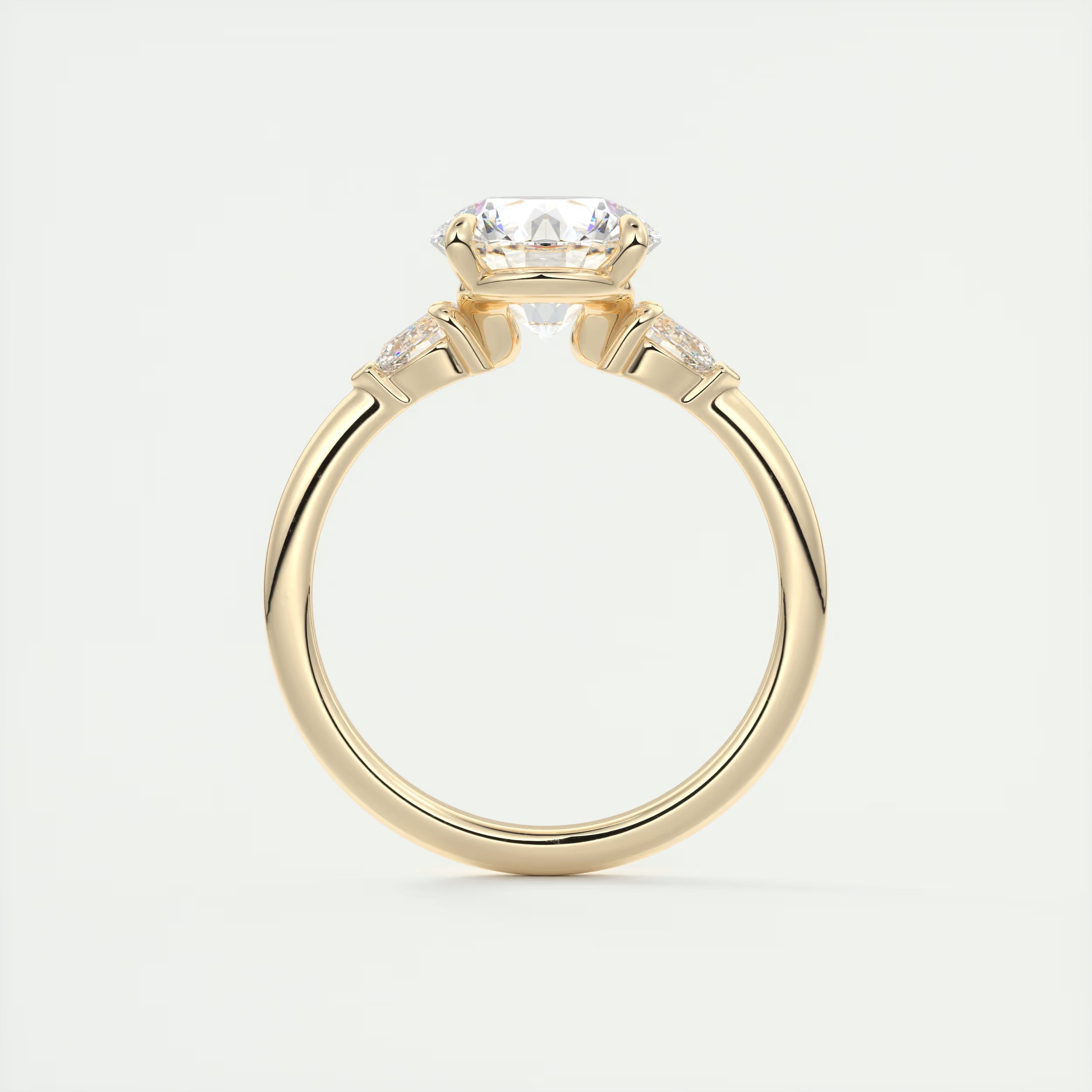 2.25 Ct Plunge Round & Pear Three Stone Engagement Rings